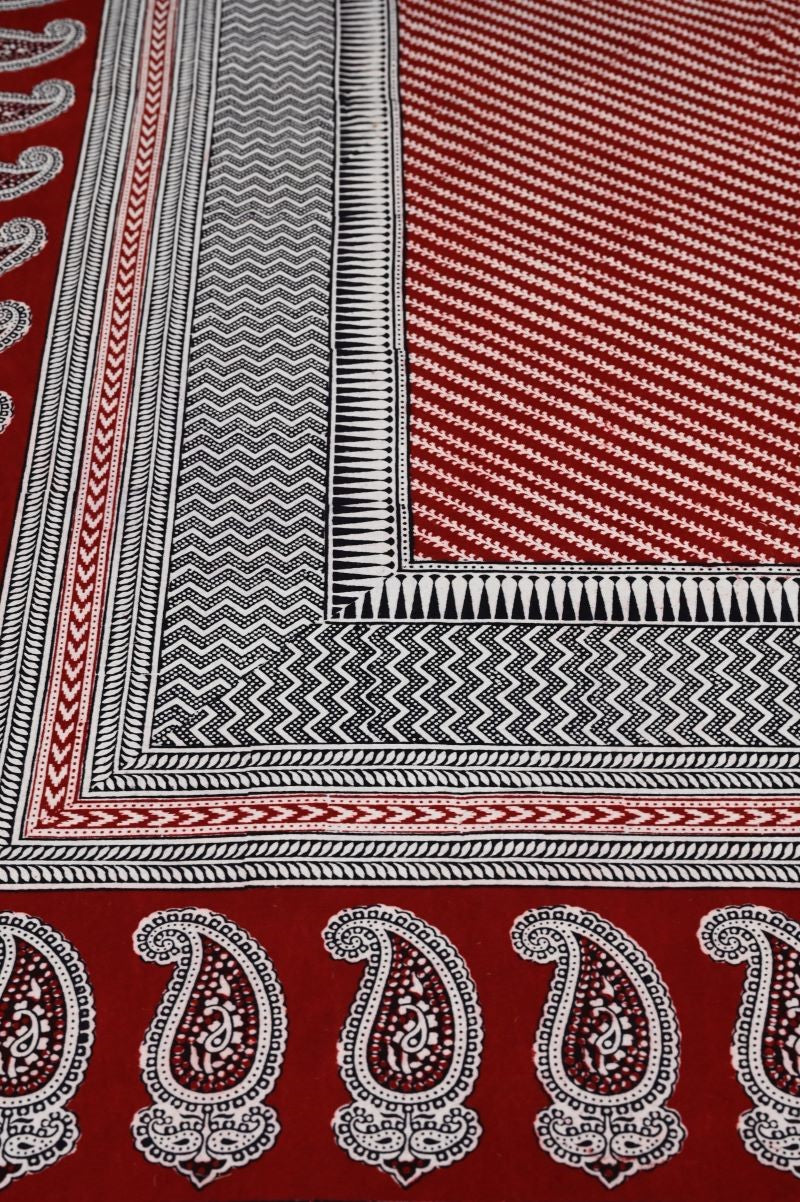Red Bagh Print Bedsheet 100% Pure Cotton Double Bed King Size in Red Black White.  With nature inspired motifs, Bagh hand block print bedsheet with 2 pillow covers are from Dhar Madhya Pradesh.