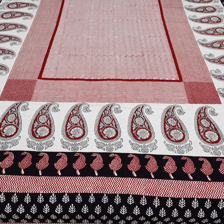 Red and White Bedsheet with Pillow Covers