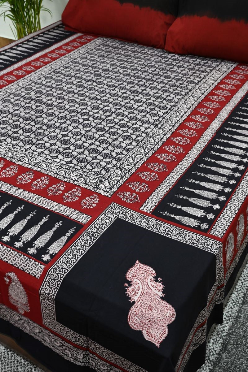 Red Bagh Print Bedsheet 100% Pure Cotton Double Bed King Size in Red Black White.  With nature inspired motifs, Bagh hand block print bedsheet with 2 pillow covers are from Dhar Madhya Pradesh. 