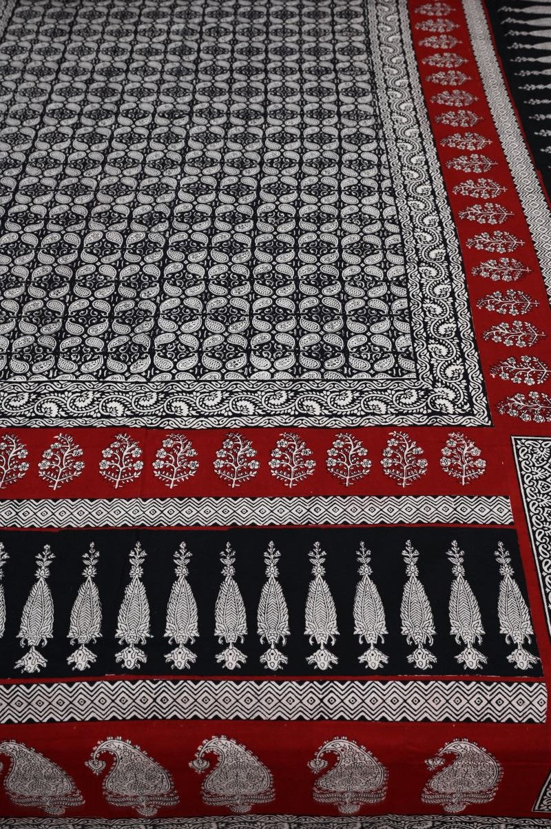 Red Bagh Print Bedsheet 100% Pure Cotton Double Bed King Size in Red Black White.  With nature inspired motifs, Bagh hand block print bedsheet with 2 pillow covers are from Dhar Madhya Pradesh. 