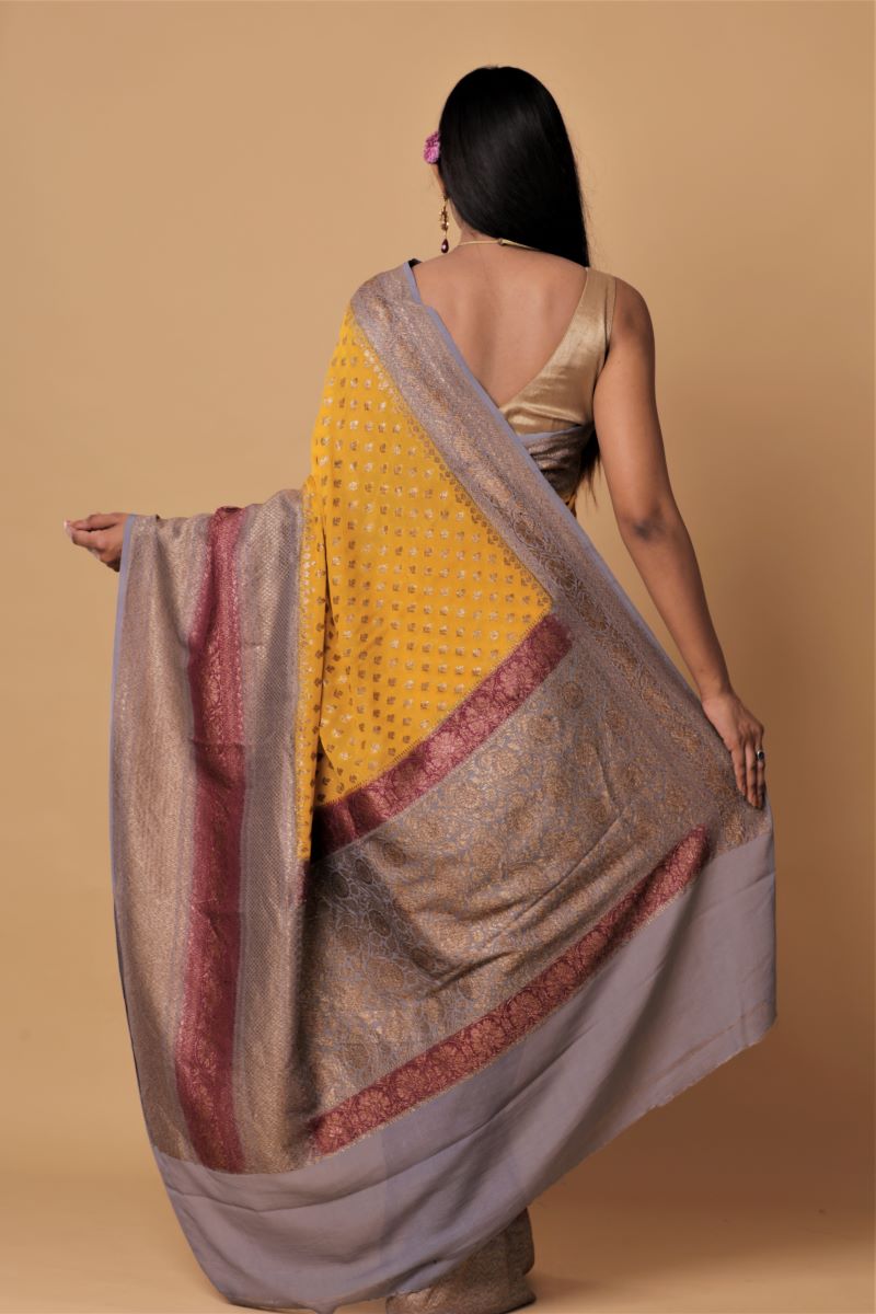 yellow-banarasi-georgette-zari-border-silk-sarees