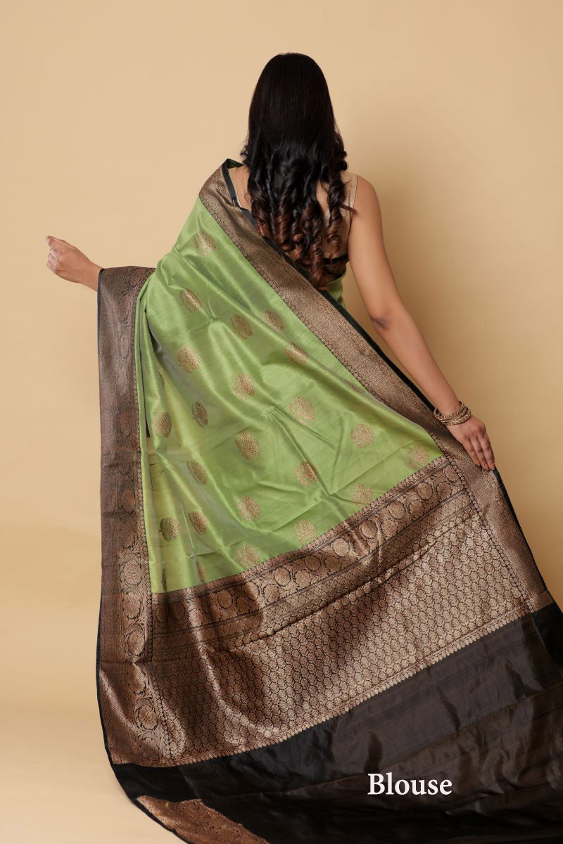 Black Green Banarasi Tussar Silk Saree is among the Handloom Banarasi Silk Saree