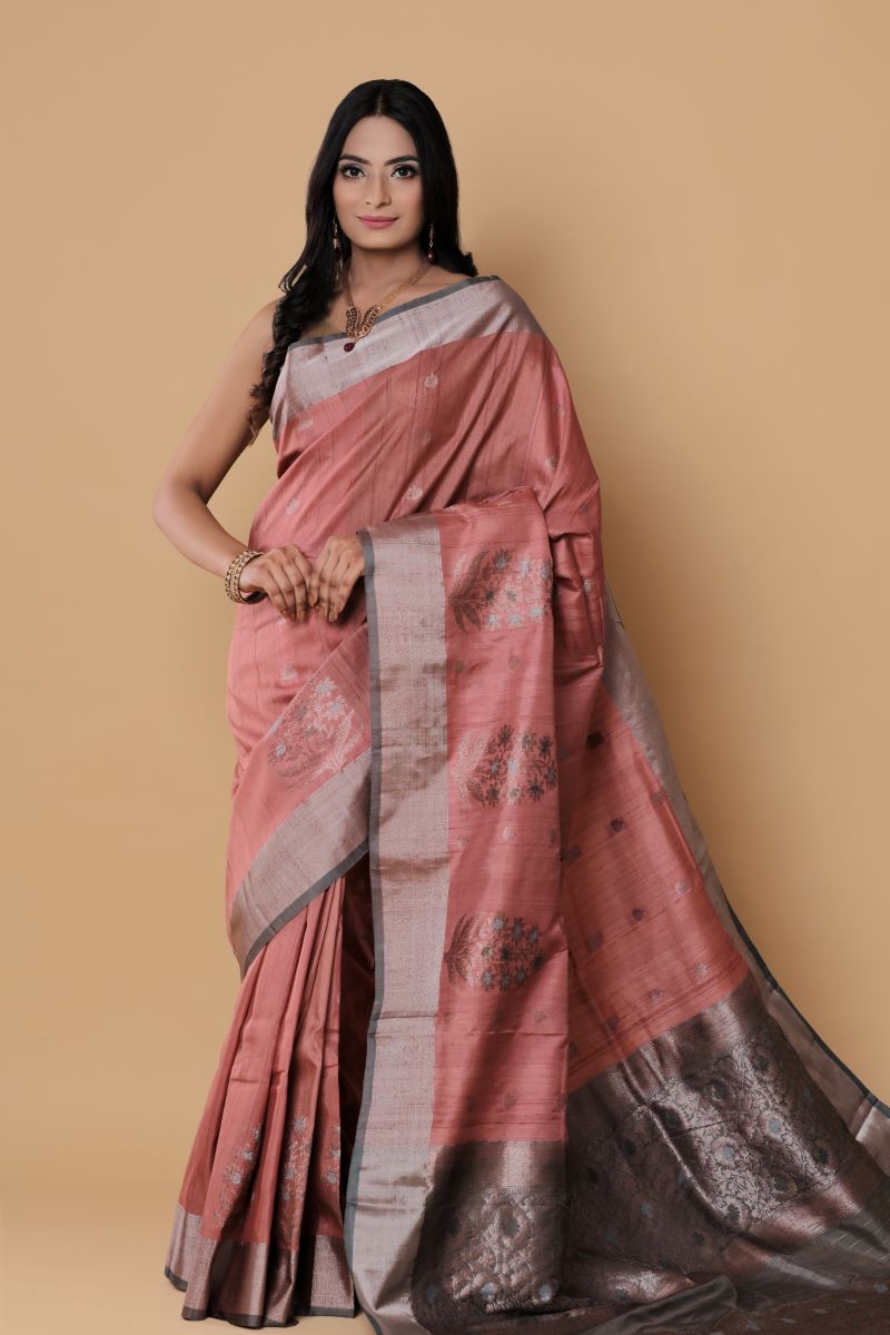 Banarasi Tussar Silk Saree has floral motifs handwoven in Zari makes it a zari border silk saree.